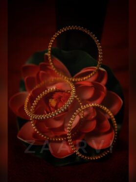 SET OF 4 PEARL LOOK-ALIKE BANGLES